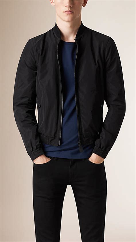 burberry black showerproof bomber jacket|Burberry cashmere cape jacket.